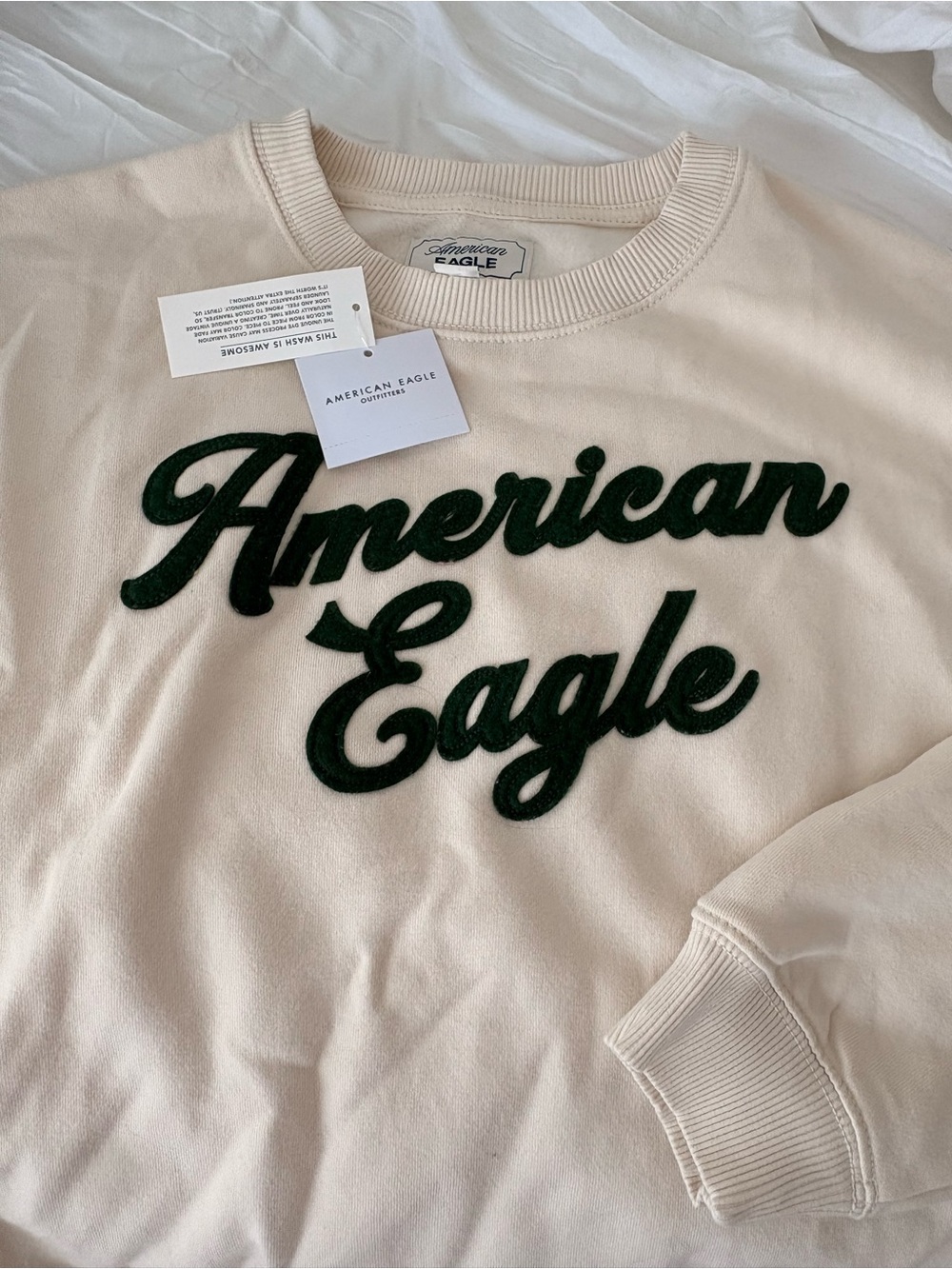 American Eagle Cream Sweatshirt with Dark Green Lettering